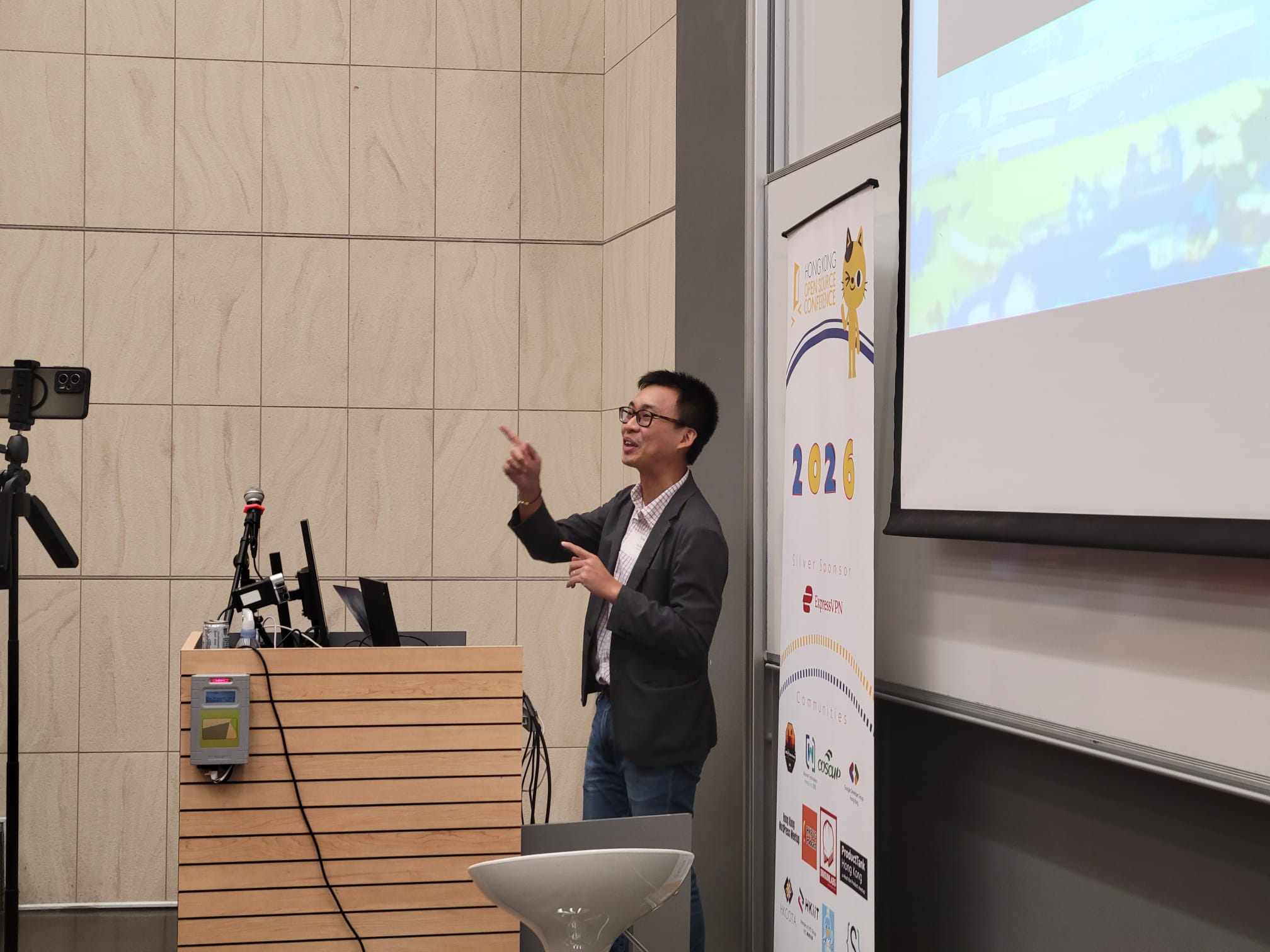 Tony Tsui presenting at HKOSCon 2026
